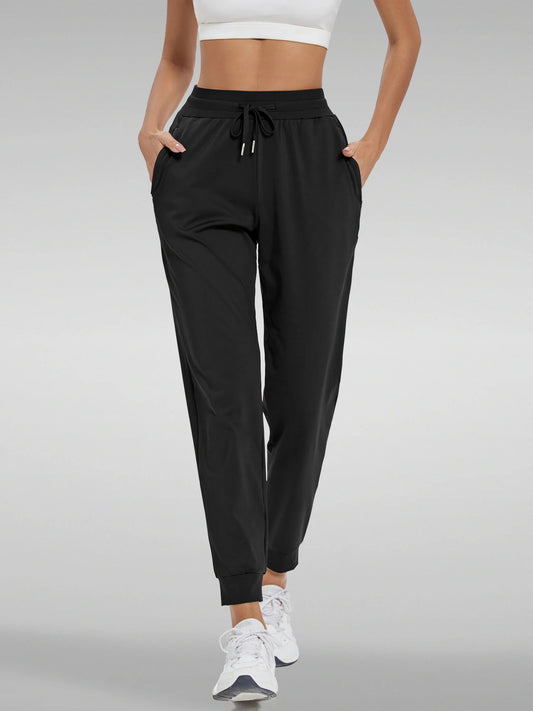 High-waisted women's joggers with pockets for workouts, yoga, or lounging.